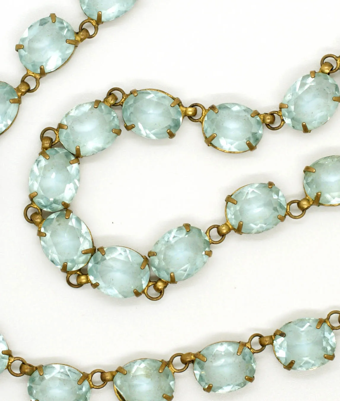 Light blue faceted glass gems