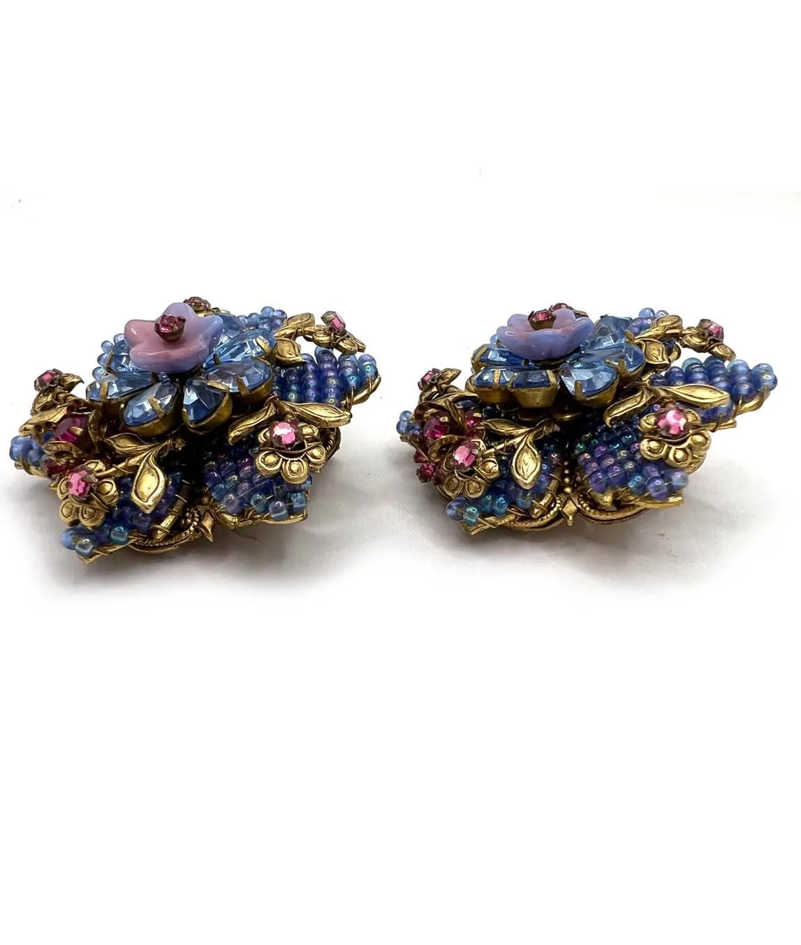 Large Vintage Stanley Hagler Clip Earrings Blue and Pink profile view
